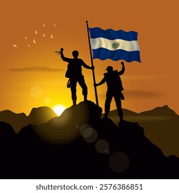 El Salvador flag, silhouette of two climbers holding flags at sunset