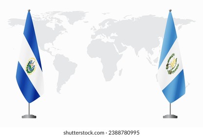 El Salvador and Guatemala flags for official meeting against background of world map.