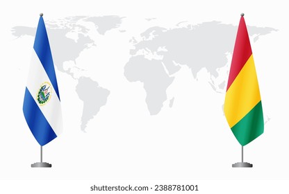 El Salvador and Guinea flags for official meeting against background of world map.