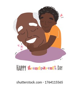 an elderly black african american man is having fun with his grandson. happy grandparents day