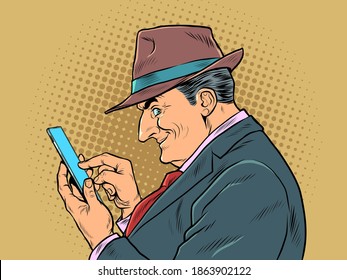 An elderly businessman with a smartphone. The boss looks at the messages. pop art retro vector illustration kitsch vintage drawing 50s 60s style