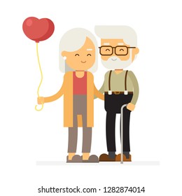 Elderly couple with a balloon, Happy valentines day.