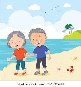 Elderly couple at the beach. Cheerful senior man and woman couple walking on the beach.