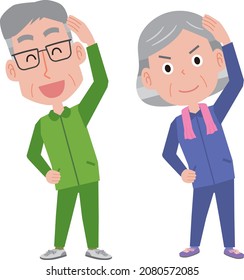 Elderly couple doing gymnastics with a smile
