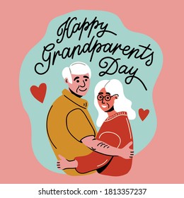 Elderly couple hug and love each other. gray-haired people exchange flogs. happy seniors day! grandparents day