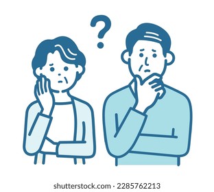 Elderly couple with question marks