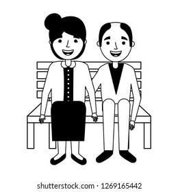 elderly couple sitting on bench