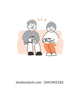 Älteres Paar, das auf dem Sofa sitzt und sich unterhält