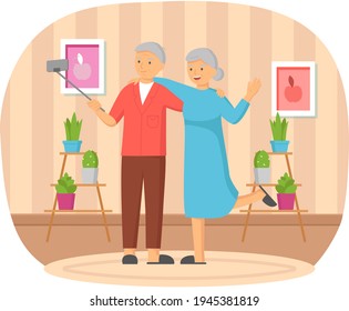 Elderly couple standing with monopod against background of window and making photo together on phone