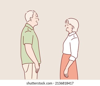 Elderly couple standing together. Grandfather with walking stick and grandmother. Hand drawn style vector design illustrations.