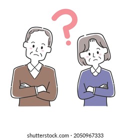 An elderly couple thinking with their arms folded
