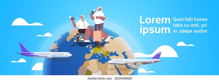 elderly couple of tourists grandparents with luggage holding passports and tickets active old age summer vacation