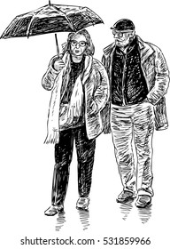 elderly couple with an umbrella