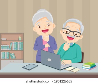 elderly couple using a laptop computer at home so happy,Senior couple at home using laptop computer