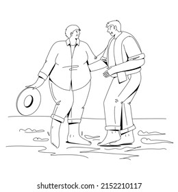 Elderly couple walking on the beach
