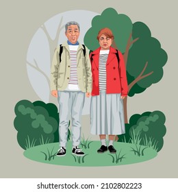 Una pareja de ancianos camina por el parque