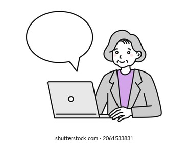A elderly female operating a computer Business parson 