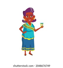 elderly indian woman offering tea cup to friend cartoon vector. elderly indian woman offering tea cup to friend character. isolated flat cartoon illustration