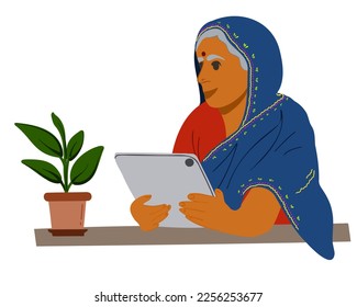 An elderly Indian woman sits at a table with a tablet. Flat vector illustration