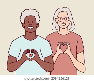  Elderly interracial couple smiles while forming a heart shape with hands. They express love, unity, and happiness.