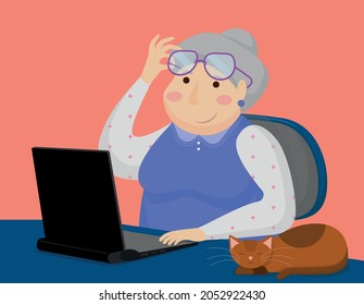 an elderly lady at the computer