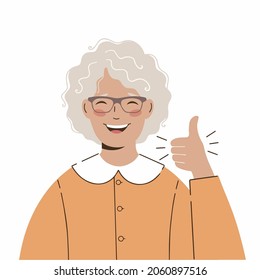 Elderly lady shows with a hand gesture that she is delighted. Hand gesture. 