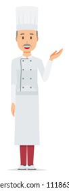 An elderly male chef wearing a cook coat is informed