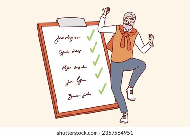 Elderly man completed all tasks and dancing near giant clipboard with list of goals and checkmarks. Gray-haired happy pensioner celebrating achievement of set goals after retirement