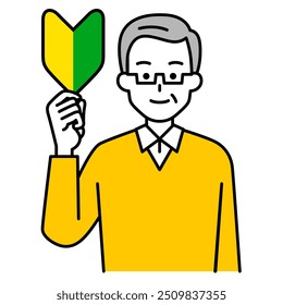 Elderly man holding up a beginner's mark