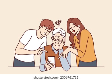 Elderly man learns to use phone and listens to advice of adult children teaching how to send SMS message. Old human is upset because of inability to use modern smartphone and online app