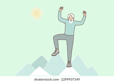 Elderly man stands on top of mountain and celebrates triumphant ascent, for concept of leadership or success. Elderly man rejoices at new achievement and leads active lifestyle after retirement