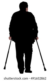 Elderly man walking with help of crutches