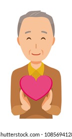 An elderly man wearing brown clothes has a heart mark