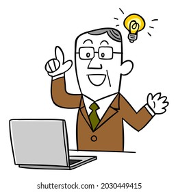 An elderly man who has an idea while working on a laptop