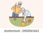 Elderly men play billiards, enjoying favorite hobby that allows them to relax and spend time with friends after retirement. Male pensioners stand near billiards table, competing in american pool