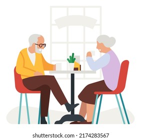 Elderly people drinking tea. Old couple sitting at table and talking