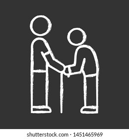 Elderly people help chalk icon. Volunteer responsibility for old people. Assistance program for pensioners. Caring about old parents. Man holds senior by hands. Isolated vector chalkboard illustration