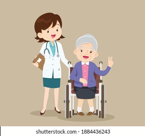 Elderly sit on a wheelchair with doctor take care.disabled person in the wheelchair and doctors. Careful caregiver taking care of the patient