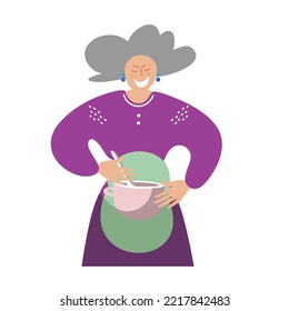 An elderly smiling woman is preparing lunch. A gray haired lady holds a saucepan in her hands