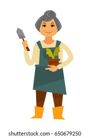 Elderly woman in apron with plant and trowel
