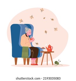 An elderly woman drinks tea at home on an armchair. Warmth and comfort in autumn, home interior. Vector illustration.