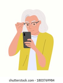 Elderly woman with glasses looks into the smartphone. Vector flat style  illustration