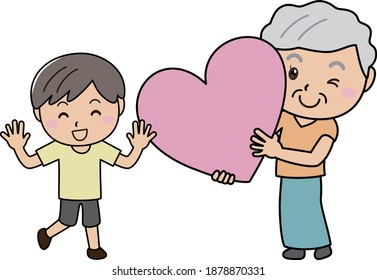 Elderly woman handing a big heart to a boy