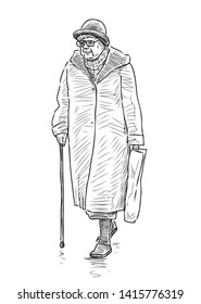 An elderly woman in a hat with a stick goes down the street