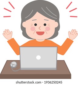 Elderly woman having discovered something very interesting on laptop computer.