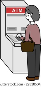 An elderly woman holding a card and operating an ATM