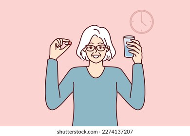 Elderly woman with pill and glass of water stands near clock following doctor prescriptions and recommendations for treatment. Concept of calendar or schedule for taking medications for treatment 