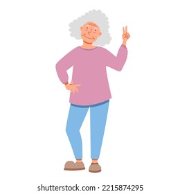 An elderly woman poses with a smile and shows two fingers.