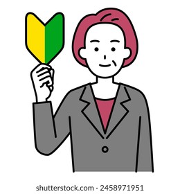 An elderly woman in a suit with a beginner mark