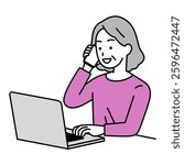 Elderly woman talking on the phone while using a laptop